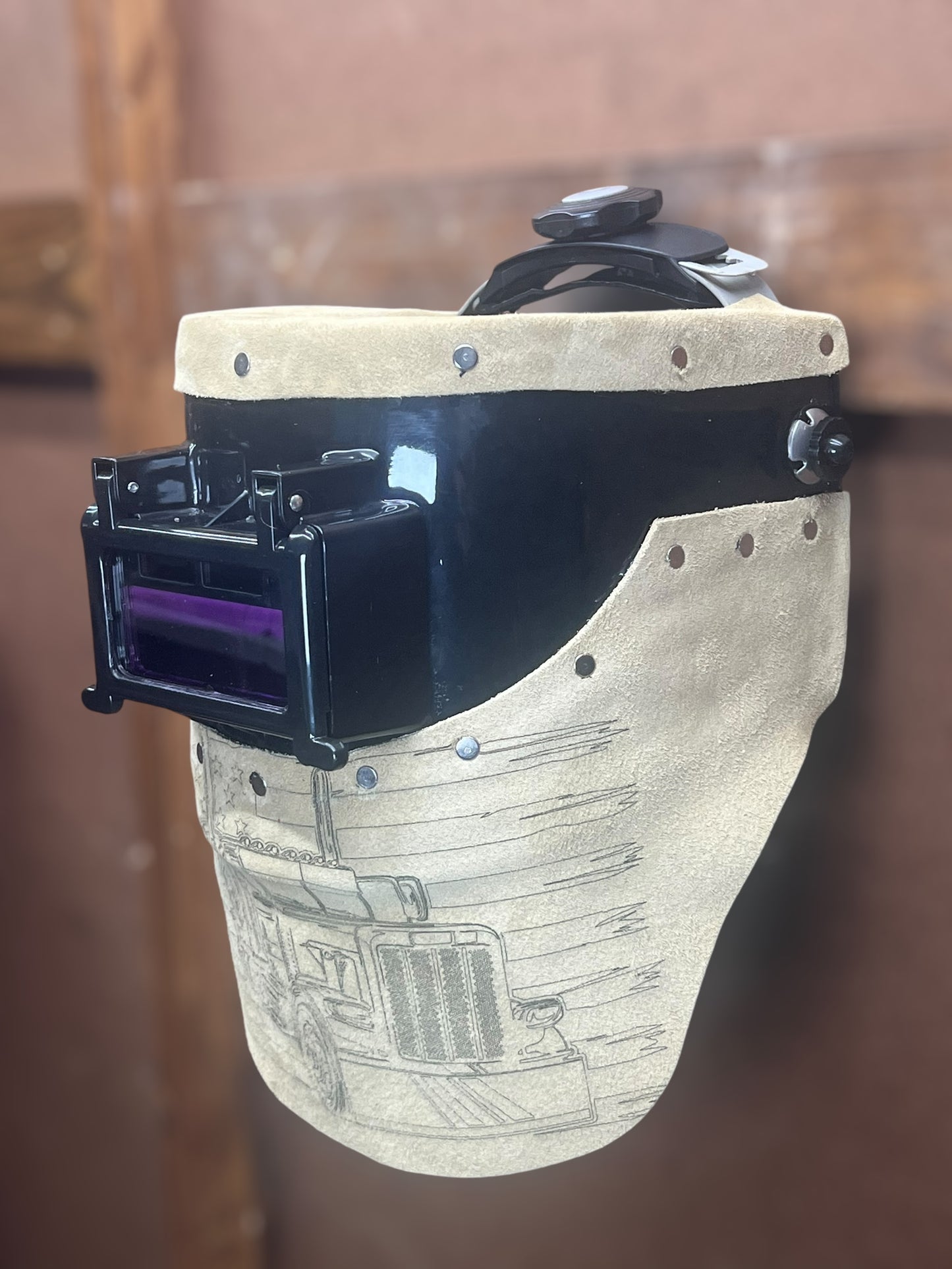 Custom, compact, leather welding hood