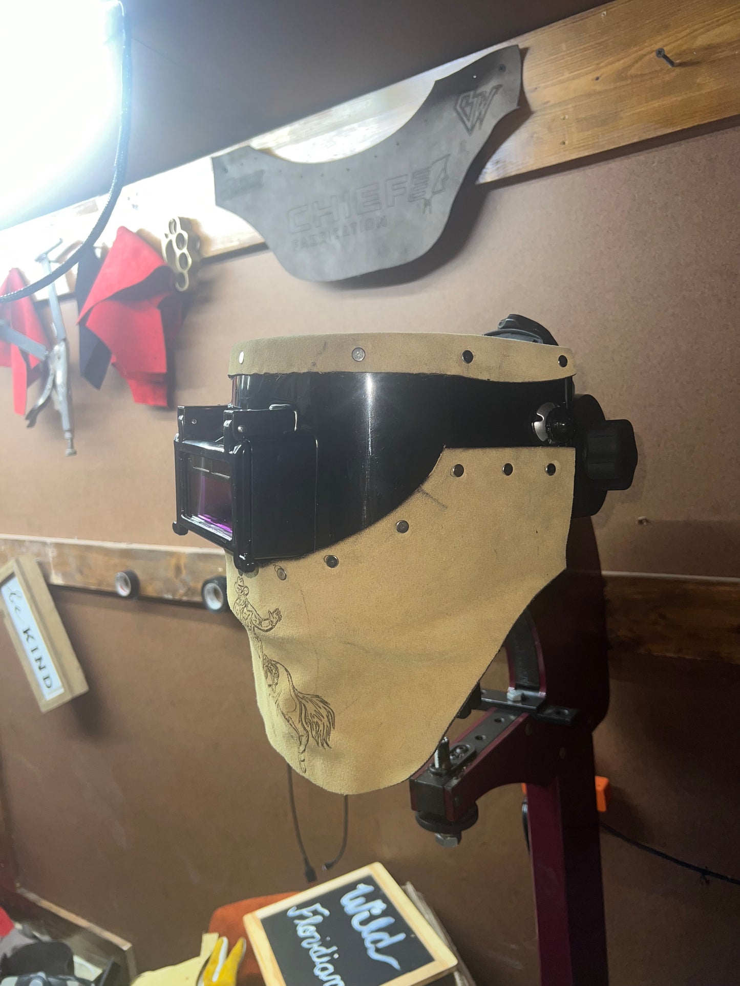 Cow puncher welding hood.