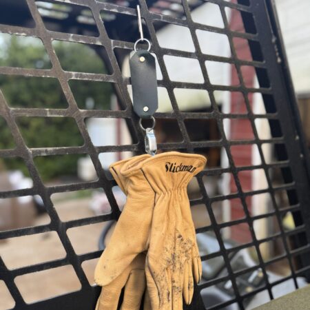 A photo of a leather work glove lanyard.